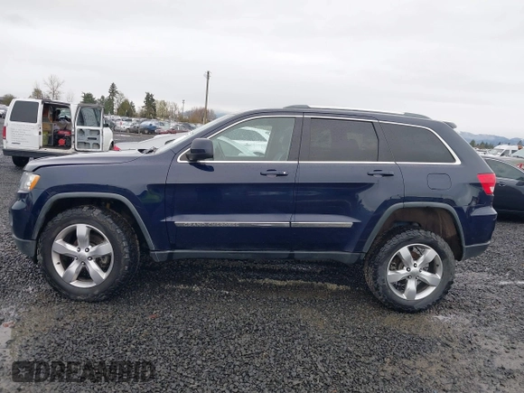 2012 Jeep Grand Cherokee Laredo with VIN 1C4RJFAG9CC220145, listed as a IAAI auction lot 41798457 with 130,603 mi miles. Bid and sale history available at carsss.com. Image 14.
