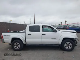 2014 Toyota Tacoma PreRunner z VIN 3TMJU4GN3EM170360, wystawiony jako IAAI lot #42438394 z przebiegiem 223 101 mil mil oraz . Historia ofert i sprzedaży dostępna na DreamBid. Obrazek 13.