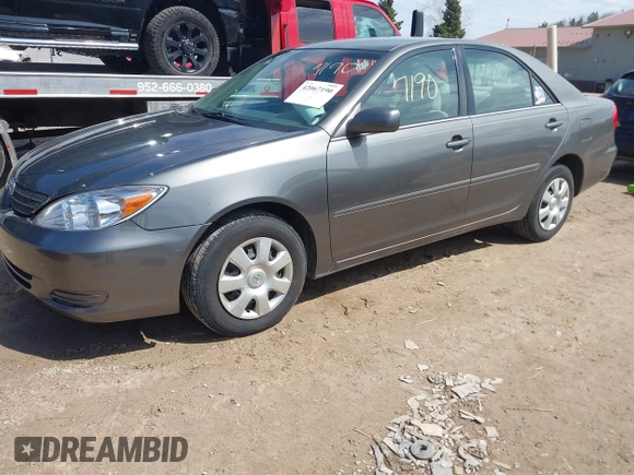2004 Toyota Camry LE with VIN 4T1BE32K24U895575, listed as a IAAI auction lot 42067190 with 283,333 mi miles. Bid and sale history available at carsss.com. Image 2.