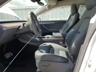 2024 Tesla Model Y Long Range with VIN 7SAYGAEE7RF205700, listed as a Copart auction lot 53814155 with 8,986 mi miles and Salvage Title. Bid and sale history available at DreamBid. Image 7.