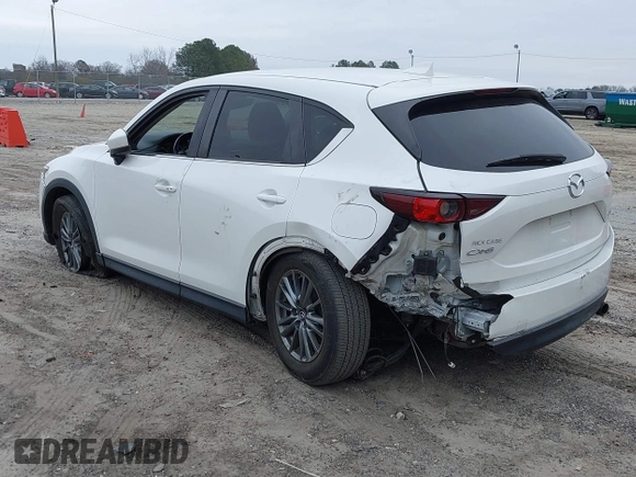 2017 Mazda CX-5 Touring with VIN JM3KFACL8H0205717, listed as a IAAI auction lot 41173725 with 107,604 mi miles. Bid and sale history available at carsss.com. Image 3.