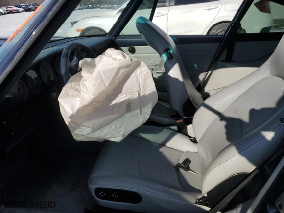 1995 Porsche 911 Carrera with VIN WP0AA299XSS323221, listed as a Copart auction lot 41735125 with 0 mi miles and Salvage Title. Bid and sale history available at carsss.com. Image 7.