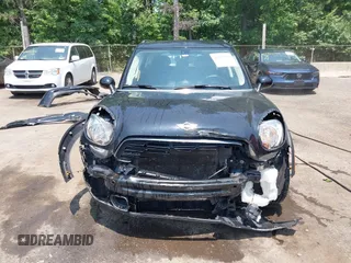 2015 MINI Countryman S z VIN WMWZC5C56FWP45115, wystawiony jako IAAI lot #42426394 z przebiegiem 52 937 mil mil oraz . Historia ofert i sprzedaży dostępna na DreamBid. Obrazek 13.