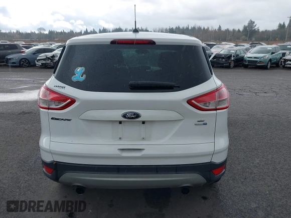 2013 Ford Escape SE with VIN 1FMCU9G93DUA17816, listed as a IAAI auction lot 41688140 with 129,738 mi miles. Bid and sale history available at carsss.com. Image 16.