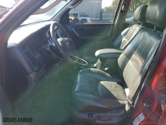 2003 Mazda Tribute ES with VIN 4F2CZ061X3KM04404, listed as a Copart auction lot 42708145 with 185,561 mi miles and Salvage Title. Bid and sale history available at carsss.com. Image 7.