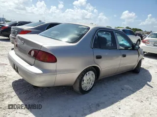 2001 Toyota Corolla CE с VIN 1NXBR12E81Z419653, выставлен на аукционе Copart как лот 60854625 с пробегом Не указан миль и Списание • Salvage title. История ставок и продаж доступна на DreamBid. Изображение 3.