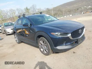 2021 Mazda CX-30 Premium with VIN 3MVDMBDM4MM238367, listed as a IAAI auction lot 42124335 with 31,120 mi miles and . Bid and sale history available at DreamBid. Image 1.