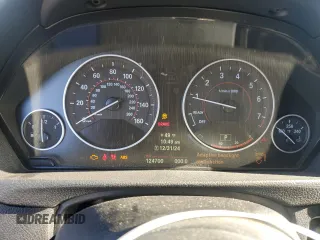 2012 BMW 3 Series 335i with VIN WBA3A9C59CF270736, listed as a Copart auction lot 87223824 with 124,700 mi miles and Salvage title. Bid and sale history available at DreamBid. Image 9.