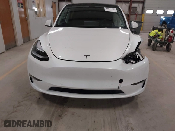 2022 Tesla Model Y Long Range z VIN 7SAYGDEE3NF358487, wystawiony jako IAAI lot #42036969 z przebiegiem 52 723 mil mil oraz . Historia ofert i sprzedaży dostępna na DreamBid. Obrazek 12.