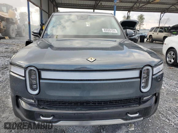 2023 Rivian R1S Launch Edition z VIN 7PDSGABL9PN022280, wystawiony jako Copart lot #83526124 z przebiegiem 51 mil mil oraz Szkoda całkowita • Salvage title. Historia ofert i sprzedaży dostępna na DreamBid. Obrazek 5.