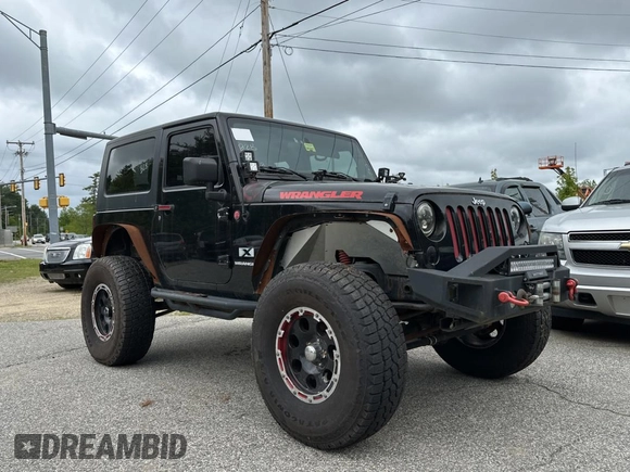 2008 Jeep Wrangler X with VIN 1J4FA24168L582227, listed as a Copart auction lot 58219065 with 98,284 mi miles and Salvage title. Bid and sale history available at DreamBid. Image 1.