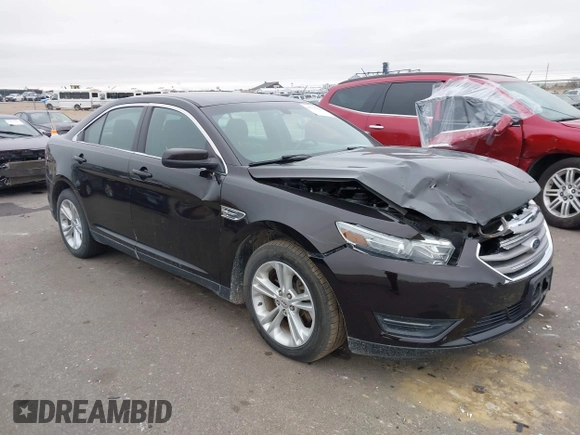 2014 Ford Taurus SEL z VIN 1FAHP2E85EG121636, wystawiony jako IAAI lot #41036886 z przebiegiem 117 460 mil mil oraz . Historia ofert i sprzedaży dostępna na DreamBid. Obrazek 1.