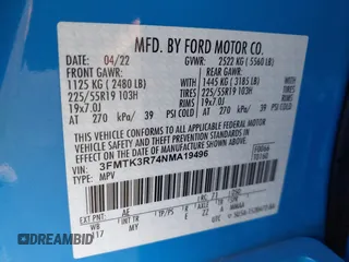 2022 Ford Mustang Mach-E Premium z VIN 3FMTK3R74NMA19496, wystawiony jako IAAI lot #42519774 z przebiegiem 19 880 mil mil oraz . Historia ofert i sprzedaży dostępna na DreamBid. Obrazek 9.
