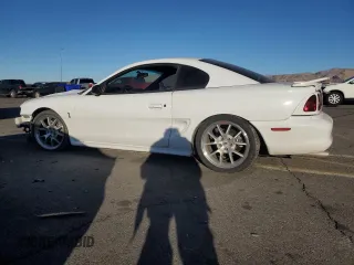 1997 Ford Mustang Cobra with VIN 1FALP47VXVF139807, listed as a Copart auction lot 88045305 with 113,571 mi miles and Salvage Title. Bid and sale history available at carsss.com. Image 2.