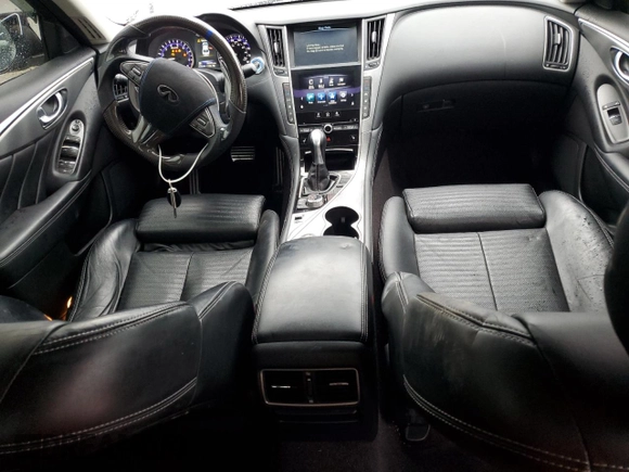 2014 Infiniti Q50 Sport with VIN JN1BV7AR7EM689473, listed as a Copart auction lot 52858085 with 99,395 mi miles and Salvage title. Bid and sale history available at DreamBid. Image 8.