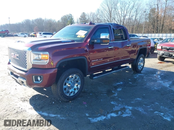 2017 GMC Sierra 2500HD Denali z VIN 1GT12UEY0HF186720, wystawiony jako IAAI lot #41580466 z przebiegiem Nie podano mil oraz . Historia ofert i sprzedaży dostępna na DreamBid. Obrazek 2.