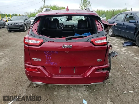 2017 Jeep Cherokee Overland with VIN 1C4PJMJS0HW574948, listed as a Copart auction lot 56225795 with 115,980 mi miles and Salvage title. Bid and sale history available at DreamBid. Image 14.