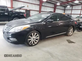 2013 Hyundai Azera z VIN KMHFH4JG5DA269144, wystawiony jako Copart lot #66930465 z przebiegiem 193 234 mil mil oraz Czysty tytuł • Clean title. Historia ofert i sprzedaży dostępna na DreamBid. Obrazek 1.