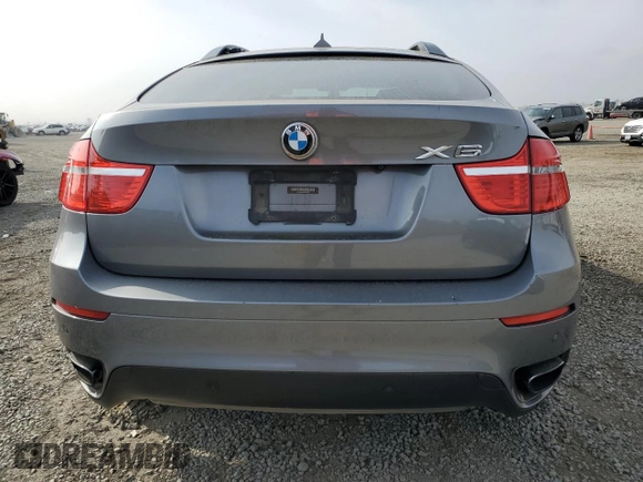 2012 BMW X6 50i z VIN 5UXFG8C53CL590367, wystawiony jako Copart lot #86650664 z przebiegiem Nie podano mil oraz Szkoda całkowita • Salvage title. Historia ofert i sprzedaży dostępna na DreamBid. Obrazek 6.