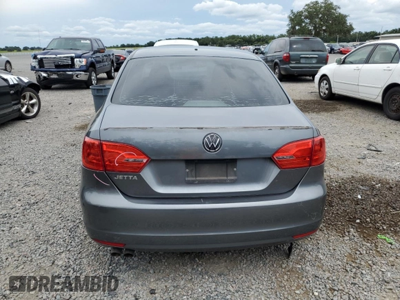 2014 Volkswagen Jetta S with VIN 3VW2K7AJ8EM231099, listed as a Copart auction lot 65752605 with 143,010 mi miles and Salvage title. Bid and sale history available at DreamBid. Image 6.
