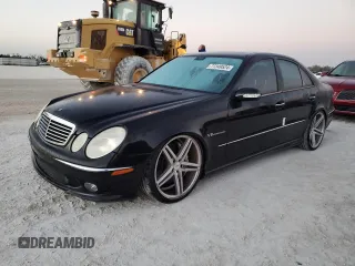 2005 Mercedes-Benz E-Class 5.5L AMG with VIN WDBUF76J05A675937, listed as a Copart auction lot 77349524 with 0 mi miles and Salvage Title. Bid and sale history available at carsss.com. Image 1.