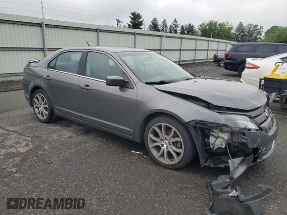 2012 Ford Fusion SE with VIN 3FAHP0HA3CR127721, listed as a Copart auction lot 64726335 with 175,332 mi miles and Salvage title. Bid and sale history available at DreamBid. Image 4.