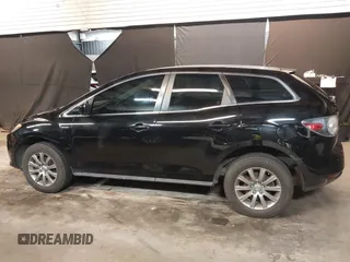 2011 Mazda CX-7 i Sport z VIN JM3ER2BM7B0393190, wystawiony jako IAAI lot #42402082 z przebiegiem 152 473 mil mil oraz . Historia ofert i sprzedaży dostępna na DreamBid. Obrazek 14.