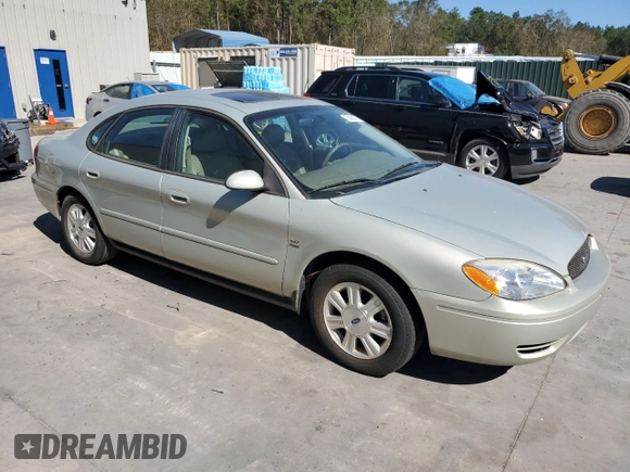 2004 Ford Taurus SEL with VIN 1FAFP56S74G186893, listed as a Copart auction lot 75484514 with 74,229 mi miles and Salvage Title. Bid and sale history available at DreamBid. Image 4.