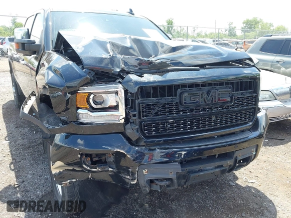 2015 GMC Sierra 2500HD Denali with VIN 1GT120E82FF574358, listed as a IAAI auction lot 42377676 with 86,097 mi miles and . Bid and sale history available at DreamBid. Image 6.