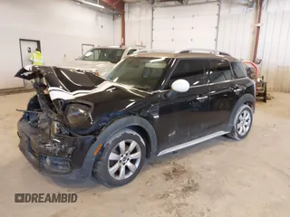 2019 MINI Countryman Cooper with VIN WMZYV5C53K3E05041, listed as a IAAI auction lot 41684566 with 65,237 mi miles. Bid and sale history available at carsss.com. Image 2.