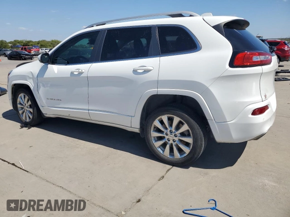 2016 Jeep Cherokee Overland with VIN 1C4PJLJS6GW303160, listed as a Copart auction lot 72262204 with 193,739 mi miles and Salvage title. Bid and sale history available at DreamBid. Image 2.