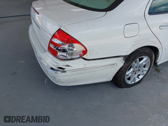 2003 Mercedes-Benz E 320 with VIN WDBUF65J43A241903, listed as a IAAI auction lot 42157490 with 122,773 mi miles and . Bid and sale history available at DreamBid. Image 6.