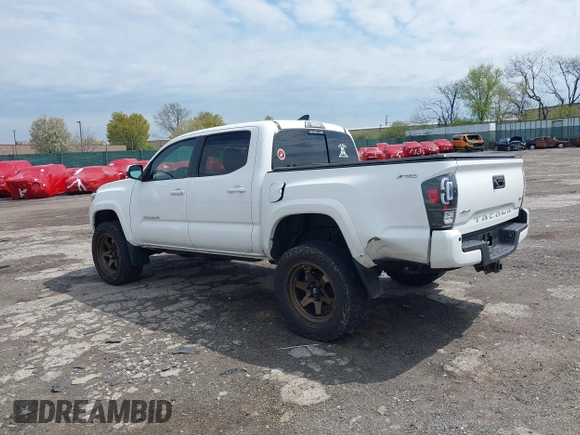 2018 Toyota Tacoma SR with VIN 3TMCZ5AN5JM125066, listed as a IAAI auction lot 41961168 with 88,497 mi miles. Bid and sale history available at carsss.com. Image 3.