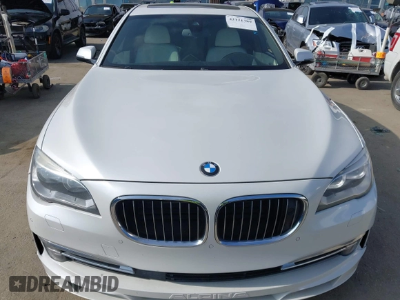 2015 BMW 7 Series 750Li with VIN WBAYE8C52FD785162, listed as a IAAI auction lot 42121389 with 88,783 mi miles and . Bid and sale history available at DreamBid. Image 12.