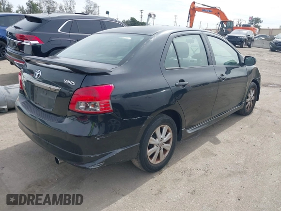 2009 Toyota Yaris with VIN JTDBT903091306668, listed as a IAAI auction lot 41688003 with 161,889 mi miles and . Bid and sale history available at DreamBid. Image 4.