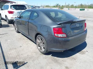 2013 Scion tC with VIN JTKJF5C73D3061994, listed as a IAAI auction lot 41785859 with 133,610 mi miles. Bid and sale history available at carsss.com. Image 3.