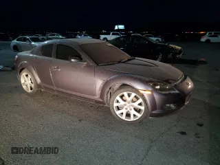 2005 Mazda RX-8 with VIN JM1FE17N950157715, listed as a Copart auction lot 76077944 with 102,174 mi miles and Salvage Title. Bid and sale history available at carsss.com. Image 4.
