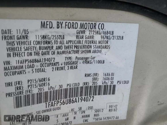 2006 Ford Taurus SEL with VIN 1FAFP56U86A194072, listed as a Copart auction lot 63779615 with 77,377 mi miles and Salvage title. Bid and sale history available at DreamBid. Image 12.