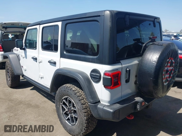 2024 Jeep Wrangler Rubicon with VIN 1C4PJXFG1RW300794, listed as a IAAI auction lot 42784578 with 22,652 mi miles and . Bid and sale history available at DreamBid. Image 3.