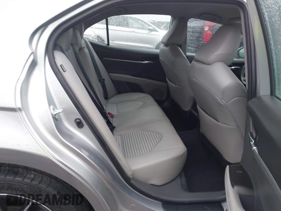 2022 Toyota Camry SE with VIN 4T1G11AKXNU697576, listed as a IAAI auction lot 41947082 with 67,199 mi miles and . Bid and sale history available at DreamBid. Image 8.