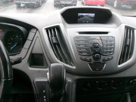 2019 Ford Transit z VIN 1FTYR1YG6KKA38047, wystawiony jako IAAI lot #42631319 z przebiegiem 118 781 mil mil oraz . Historia ofert i sprzedaży dostępna na DreamBid. Obrazek 1.