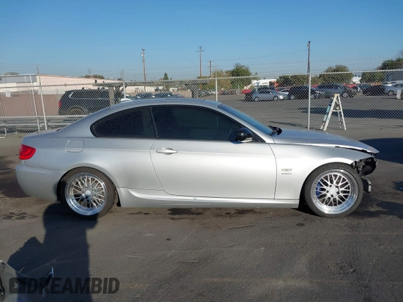 2011 BMW 3 Series 335is with VIN WBAKG1C57BE618727, listed as a IAAI auction lot 41234102 with 154,007 mi miles and . Bid and sale history available at carsss.com. Image 13.