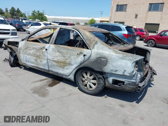 2003 Toyota Camry LE z VIN 4T1BF30K33U551509, wystawiony jako IAAI lot #42159776 z przebiegiem Nie podano mil oraz . Historia ofert i sprzedaży dostępna na DreamBid. Obrazek 3.