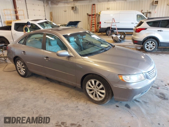 2007 Hyundai Azera SE z VIN KMHFC46F87A173110, wystawiony jako IAAI lot #42275974 z przebiegiem 208 901 mil mil oraz . Historia ofert i sprzedaży dostępna na DreamBid. Obrazek 1.