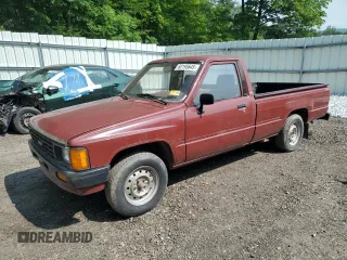 1986 Toyota Pickup z VIN JT4RN55R2G0227195, wystawiony jako Copart lot #60195645 z przebiegiem 88 825 mil mil oraz Czysty tytuł • Clean title. Historia ofert i sprzedaży dostępna na DreamBid. Obrazek 1.