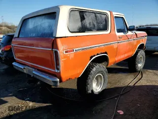 1979 Ford Bronco z VIN U15HLEE8842, wystawiony jako Copart lot #65230804 z przebiegiem 65 958 mil mil oraz Szkody całkowita. Historia ofert i sprzedaży dostępna na DreamBid. Obrazek 3.