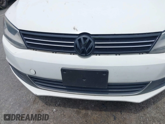 2014 Volkswagen Jetta TDI w/Premium/Nav with VIN 3VWLL7AJ4EM430524, listed as a IAAI auction lot 42268673 with 137,721 mi miles and . Bid and sale history available at DreamBid. Image 6.