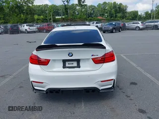 2015 BMW M4 with VIN WBS3R9C59FK329932, listed as a IAAI auction lot 42721629 with 108,029 mi miles and . Bid and sale history available at DreamBid. Image 16.