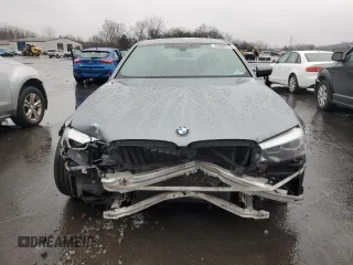 2018 BMW 5 Series 530i xDrive z VIN WBAJA7C55JWA73879, wystawiony jako Copart lot #42800575 z przebiegiem 75 401 mil mil oraz Szkoda całkowita • Salvage title. Historia ofert i sprzedaży dostępna na DreamBid. Obrazek 5.