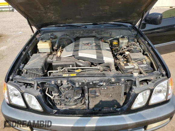 1998 Lexus LX 470 z VIN JT6HT00W0W0022045, wystawiony jako Copart lot #64022034 z przebiegiem 207 846 mil mil oraz Szkoda całkowita • Salvage title. Historia ofert i sprzedaży dostępna na DreamBid. Obrazek 12.